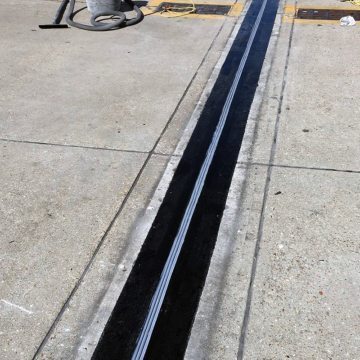 DSM System installed into blockouts filled with Emcrete elastomeric-concrete