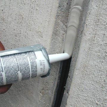Liquid sealant is gunned over Backerseal