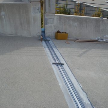 Hundreds of feet of deck expansion joint at the vast parking facility of the Morris Crossroads Corporate Center was replaced using the Seismic Joint System-SJS from EMSEAL.