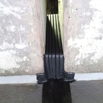 Double downturn expansion joint filler transitions for parking expansion joint - Emseal